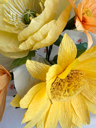 Close-up of Sunshine on my Shoulder arrangement featuring the delicate petals of the sunflower and poppy