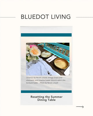 Outdoor table set with ceramic plates, silverware, earthy linens and Unwilted's Peony For Your Thoughts paper flower bouquet